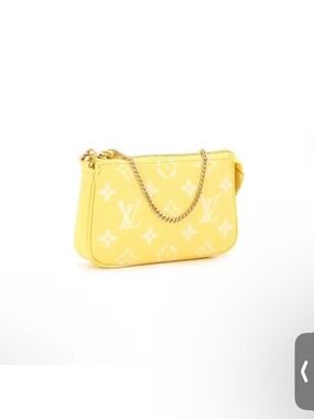 Lemon mini pochette empriente leather